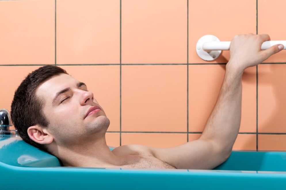 a man takes a bath with soda to enlarge his penis